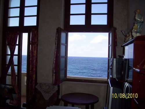 'View from the living room' is what you can see in this casa particular picture. Casas particulares are an alternative to hotels in Cuba. Check our website cuba-particular.com often for new casas.